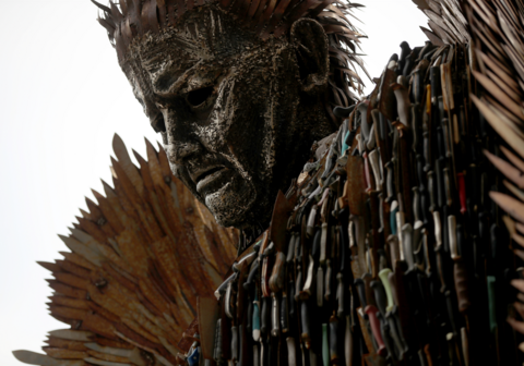 Close up of face of Knife Angel, a 27ft sculpture built using 100,000 knives collected through amnesties and confiscations