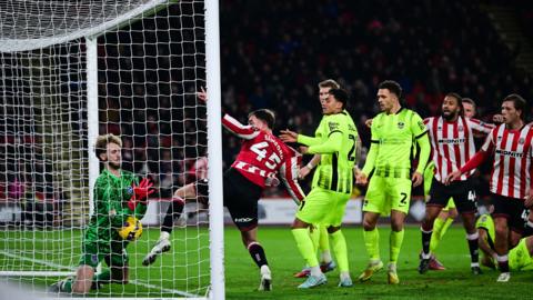 Patrick Bamford of Sheffield United scores past Nicolas Schmid of Portsmouth during the Sky Bet Championship match between Sheffield United and Portsmouth at Bramall Lane on November 26, 2025