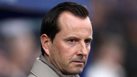 Queens Park Rangers boss Julien Stephan looking on from the touchline.