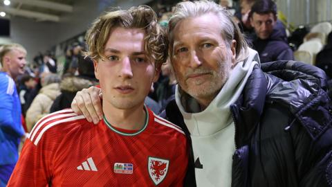 Charlie Savage and father Robbie Savage, both Wales internationals