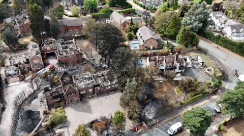 An aerial image taken with a drone of fire damaged properties in Stourbridge, showing burned out homes.