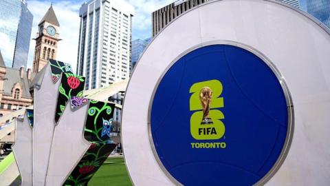 The Toronto sign decorated with FIFA World Cup graphics is seen at Nathan Phillips Square 