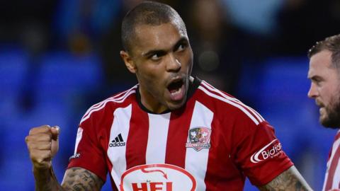 Josh Magennis celebrates scoring a goal