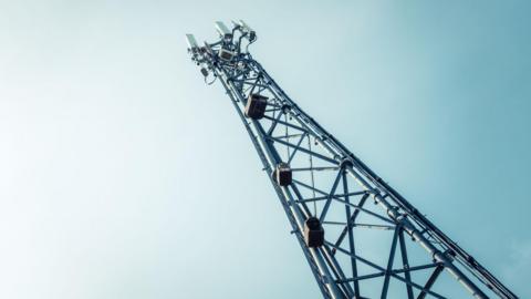 A Telecommunications, Cellphone Or Mobile Phone Tower With Copy Space