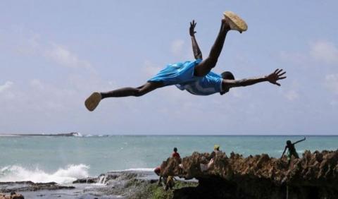 A man diving into the sea