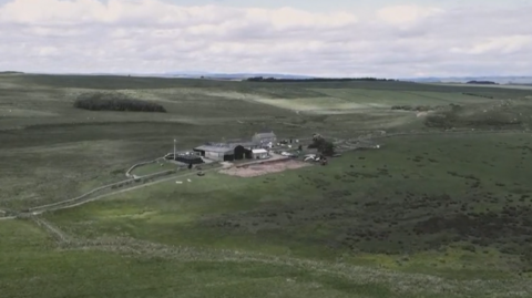 An aerial image of a remote farm 