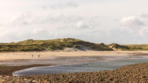 The view of the natural sand dunes on Lindisfarne 