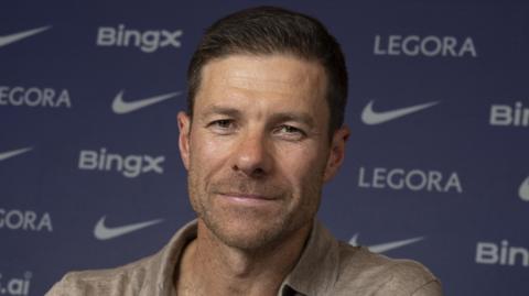 Xabi Alonso smiles being presented as Chelsea manager