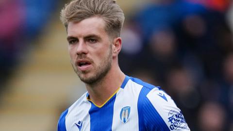 Jack Tucker playing for Colchester United