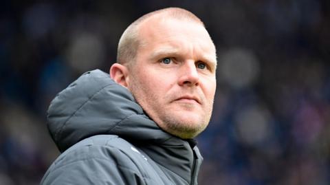 Bristol City manager Liam Manning watches on as his team lose one-nil to Coventry.