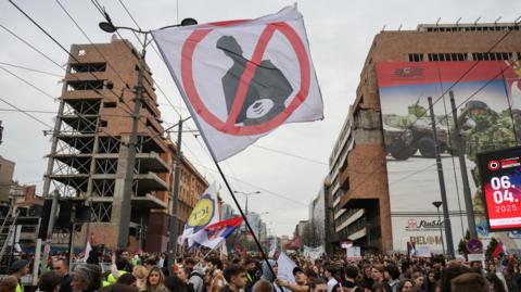 Students protest the government lease of the former Yugoslav army headquarters to Affinity Partners.