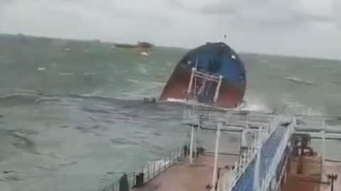 Image an oil tanker sinking. 