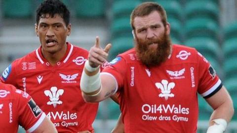 Sam Lousi and Jake Ball in action for Scarlets in 2020