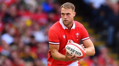 Max Llewellyn holding ball for Wales