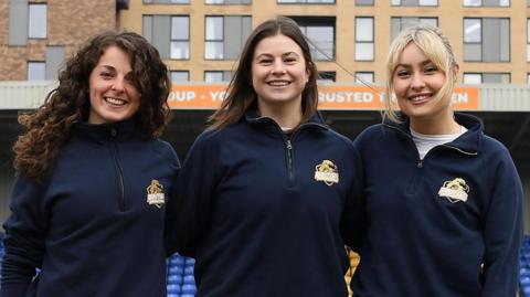 Kate Bruinvels, Ellie Thorpe and Kellie Barrett pictured at a flag football event in Wimbledon
