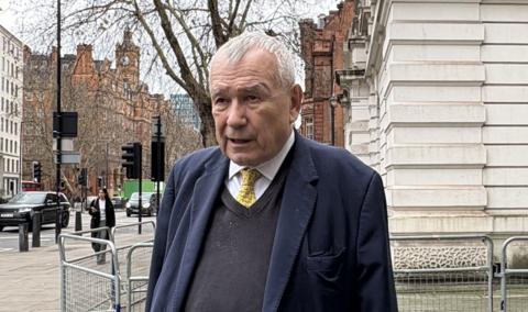 Lord Tim Razzall leaves Westminster Magistrates Court in London, where he was handed a two-week discretionary disqualification after pleading guilty to driving through a red light. 