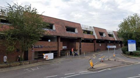 The outside of the swan shopping centre seen from the road