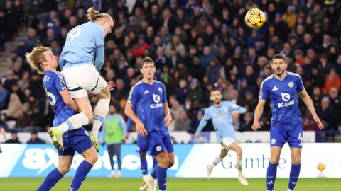 Erling Haaland scores Manchester City's second goal at Leicester.