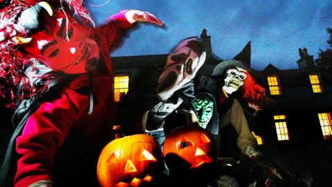 Trick or treaters in costumes 