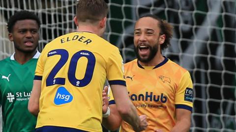 Marcus Harness celebrates scoring for Derby at Plymouth