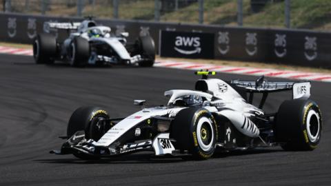Cadillac;s Valtteri Bottas and Sergio Perez at the Hungarian Grand Prix