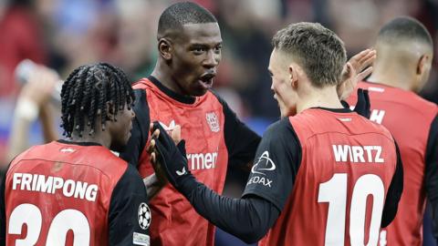 Nordi Mukiele of Leverkusen celebrates