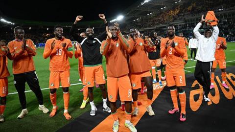 Ivory Coast celebrate beating France in Nantes