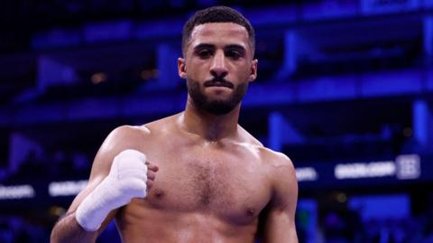 Galal Yafai holds up his fist
