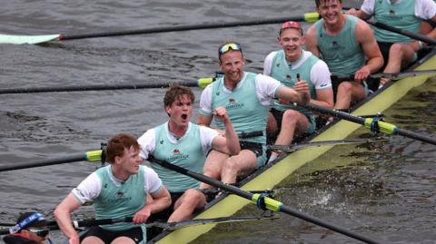 Cambridge celebrate winning the men's race