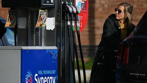 A motorist refuels a vehicle with diesel fuel at an Esso petrol station in Lutterworth, near Rugby in central England, on March 10, 2026.