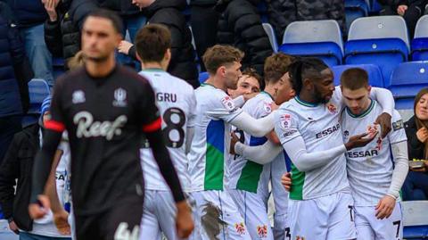 Joe Ironside celebrates scoring Tranmere Rovers' second goal against Crawley Town with his team-mates