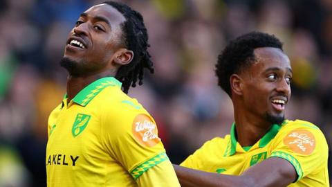 Norwich City player Paris Maghoma celebrates his goal against West Bromwich Albion, congrtaulated by teammate Ali Ahmed.