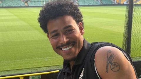 Onel Hernandez at Carrow Road, showing off the Canary tattoo on his left shoulder 