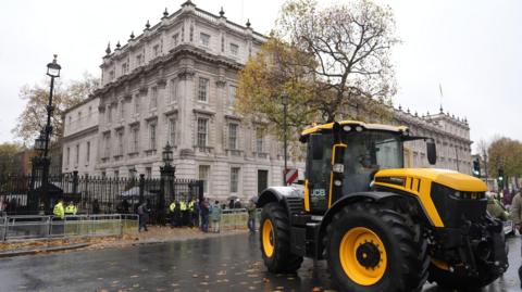 A tractor outside Downing Street as farmers gather to protest in central London over the changes to inheritance tax 