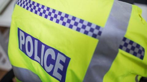 Generic shot of policeman in a hi-vis jacket