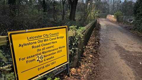 A yellow warning sign