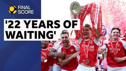 Arsenal celebrate winning the 2025-26 Premier League by lifting their trophy