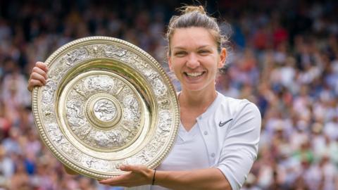 Simona Halep with the Wimbledon women's singles trophy - the Venus Rosewater Dish - in 2019