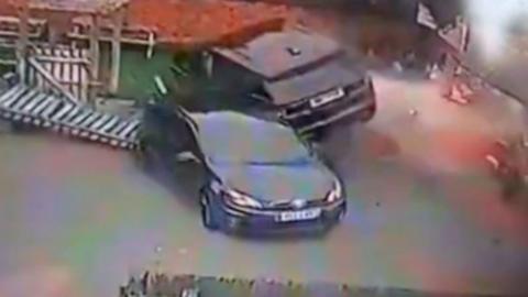 Range Rover toppled on its side after crashing into pub beer garden