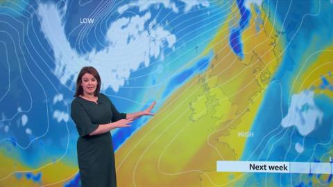 BBC weather presenter Gillian Smart in front of a weather map of the UK.