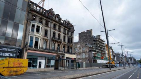 A general view of the burnt-out former Debenhams department store on Princes Street.