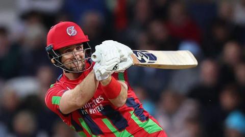 Liam Livingstone whipping a shot away through the legside, batting for Lancashire in a T20 game