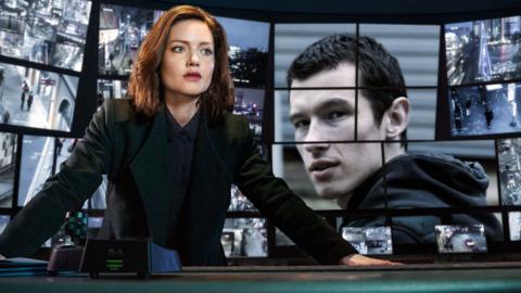 A woman leans on a desk, looking serious. A screen behind her shows a shady-looking man 