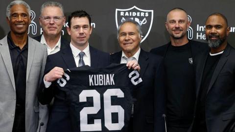 Klint Kubiak being introduced as the new Las Vegas Raiders head coach, with former players and general manager John Spytek on 10 February 2026