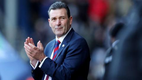 Tommy Widdrington, Manager of Aldershot Town, looks on prior to the Emirates FA Cup Third Round match between West Bromwich Albion and Aldershot Town 