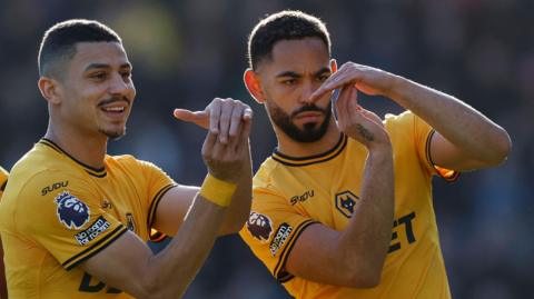 Matheus Cunha celebrates scoring Wolves' first goal with Andre