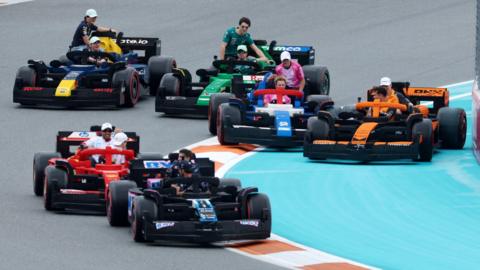General view of drivers in full size Lego replica F1 car during the drivers parade