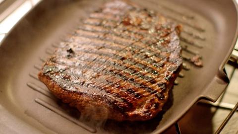 Steak cooked in a grill pan.