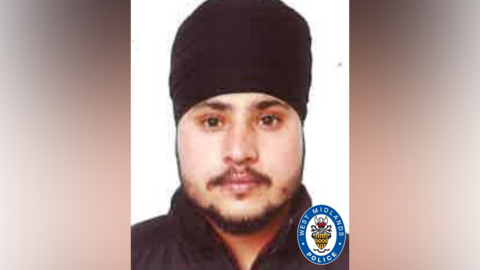 A man wearing a turban looks into the camera. A West Midlands Police logo is on the right hand side of the image.