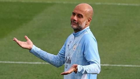 Pep Guardiola at Manchester City's training session before they played Napoli